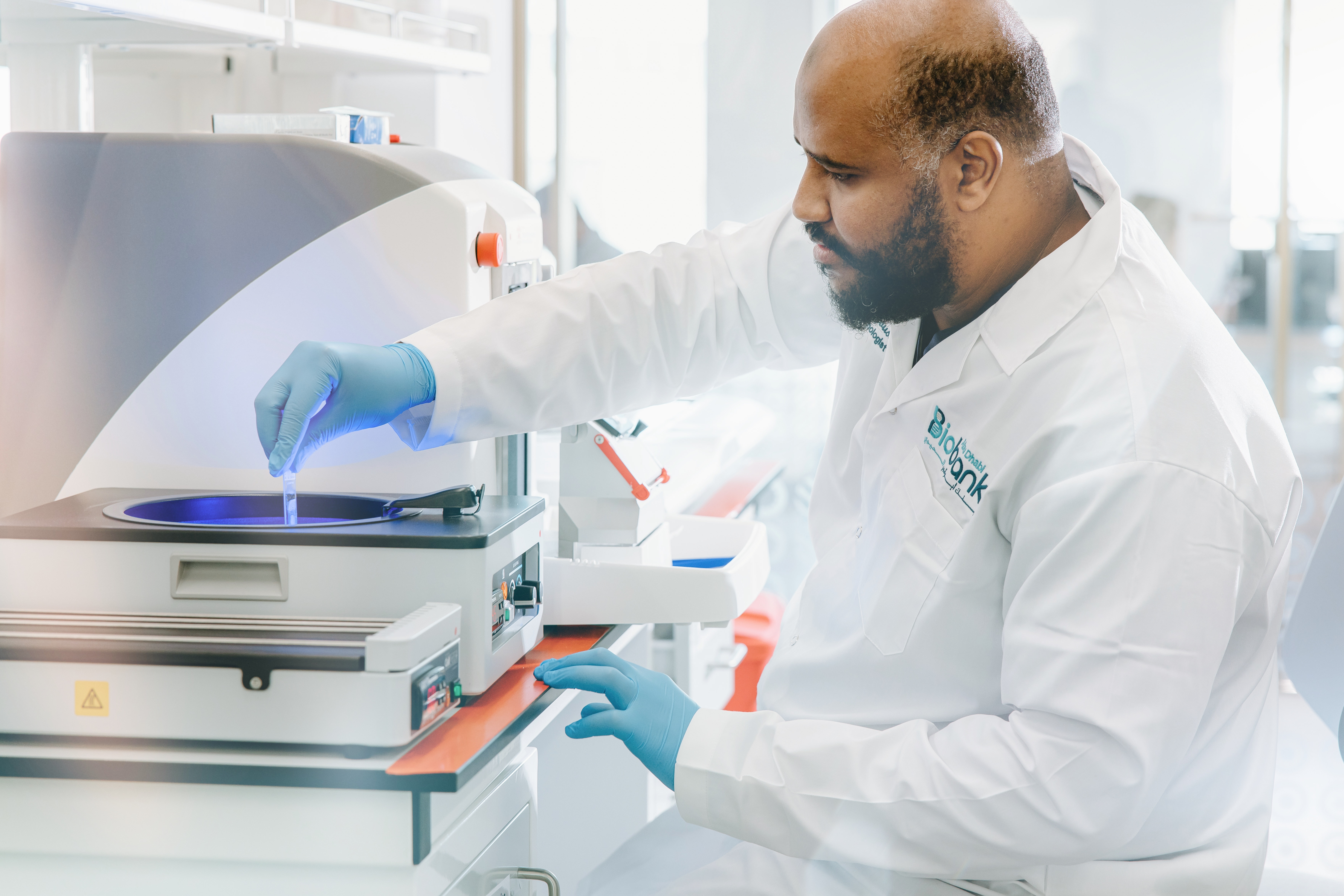 Abu Dhabi Biobank specialist working with cord blood storage equipment