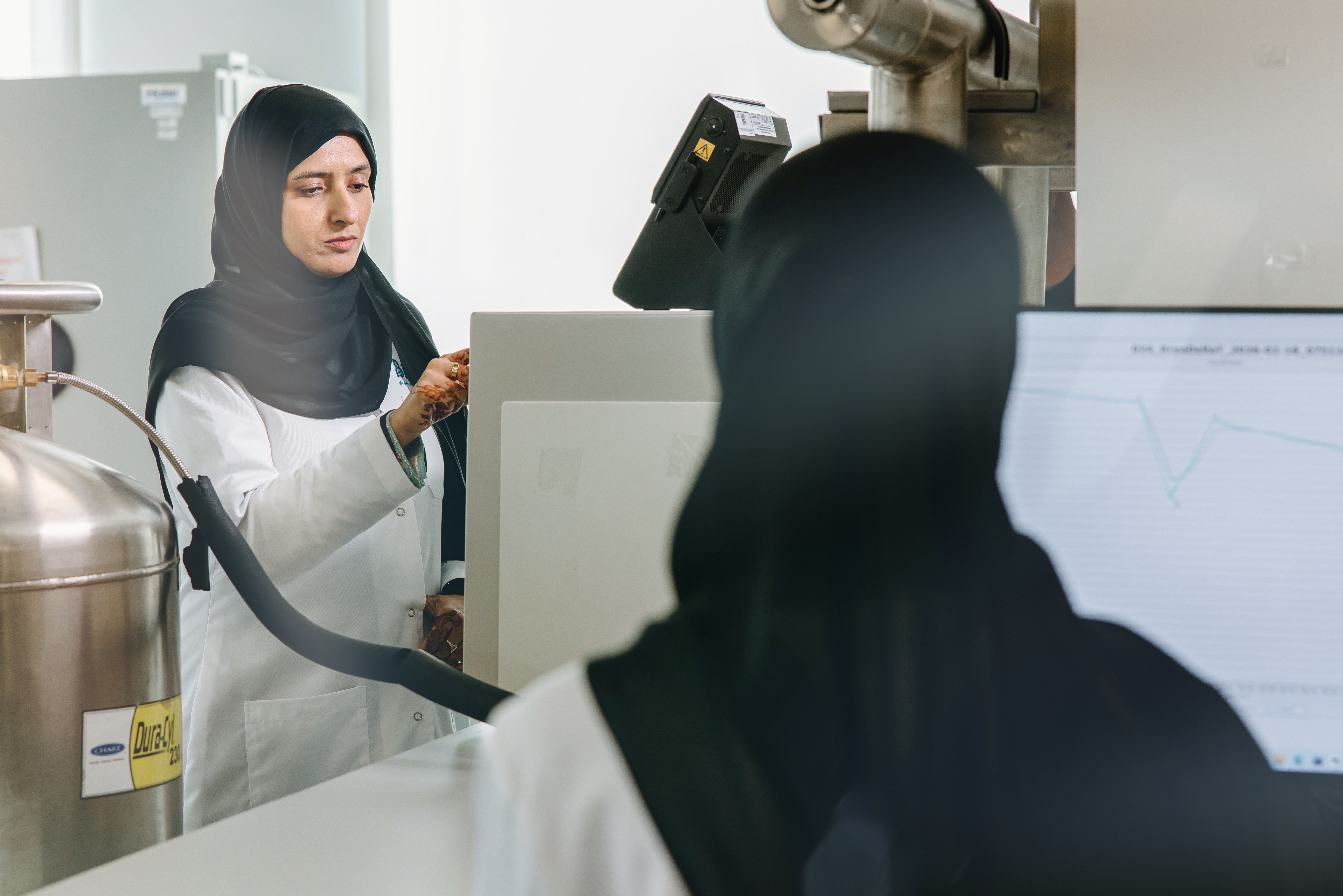 Abu Dhabi Biobank specialist handling samples for cord blood banking